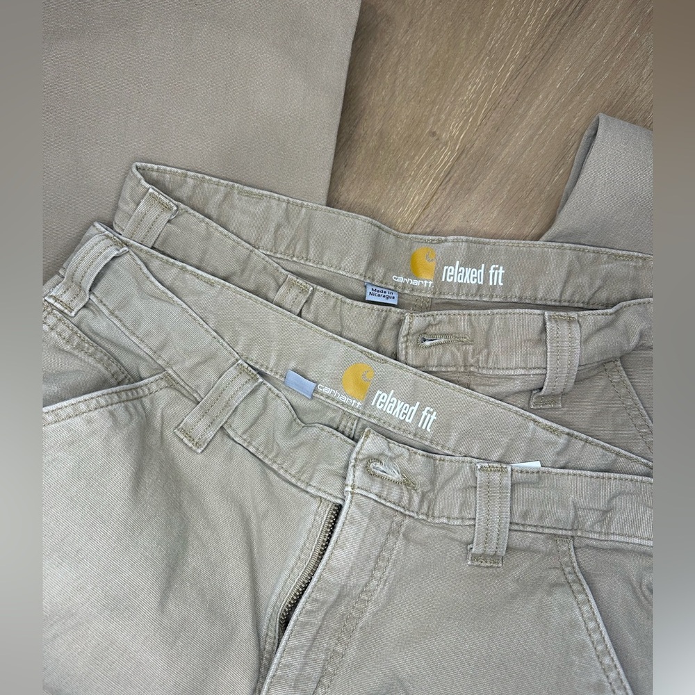 TWO PAIR of Carhartt size 32x34. Tan. Super soft material unlike most Carhartt